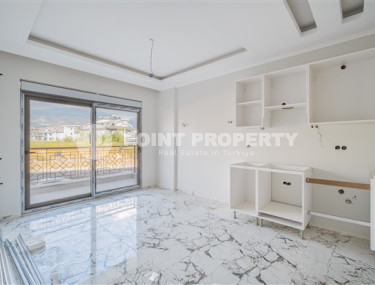 Небольшие апартаменты 1+1 на завершающем этапе строительства в двух километрах от моря в престижном районе Аланьи Оба.-id-4403-фото-2