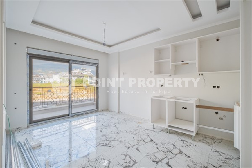 Небольшие апартаменты 1+1 на завершающем этапе строительства в двух километрах от моря в престижном районе Аланьи Оба.-id-4403-фото-2