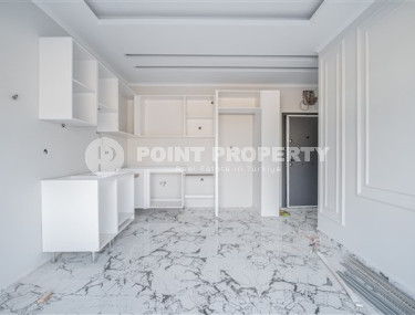 Небольшие апартаменты 1+1 на завершающем этапе строительства в двух километрах от моря в престижном районе Аланьи Оба.-id-4403-фото-3