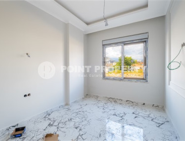 Небольшие апартаменты 1+1 на завершающем этапе строительства в двух километрах от моря в престижном районе Аланьи Оба.-id-4403-фото-4