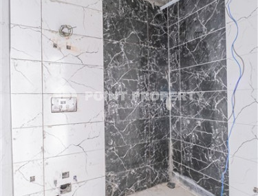 Небольшие апартаменты 1+1 на завершающем этапе строительства в двух километрах от моря в престижном районе Аланьи Оба.-id-4403-фото-5