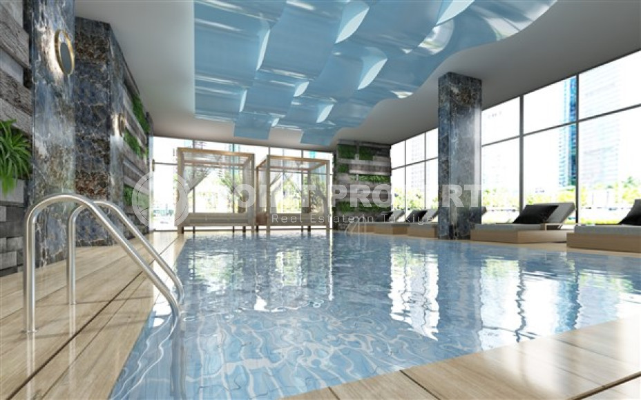 Apartment 1+1 in a new generation residence in the modern Mahmutlar area of Alanya.-id-4404-photo-5