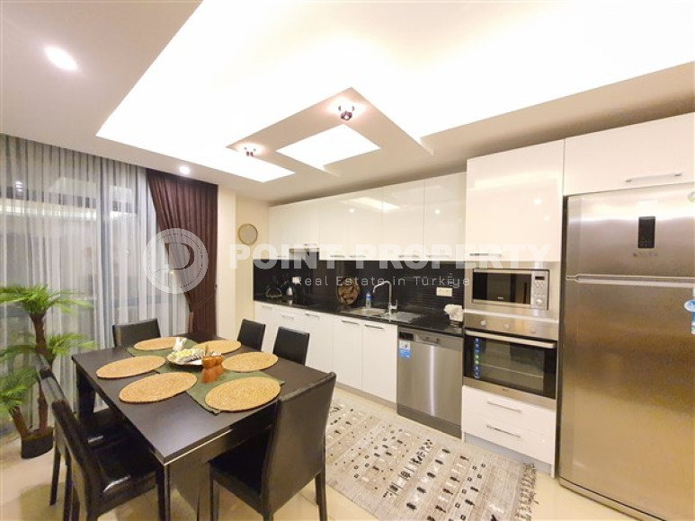 Квартира с двумя спальнями, 125м², с видом на горы в элитном комплексе в районе Алании – Джикджилли-id-2320-фото-3