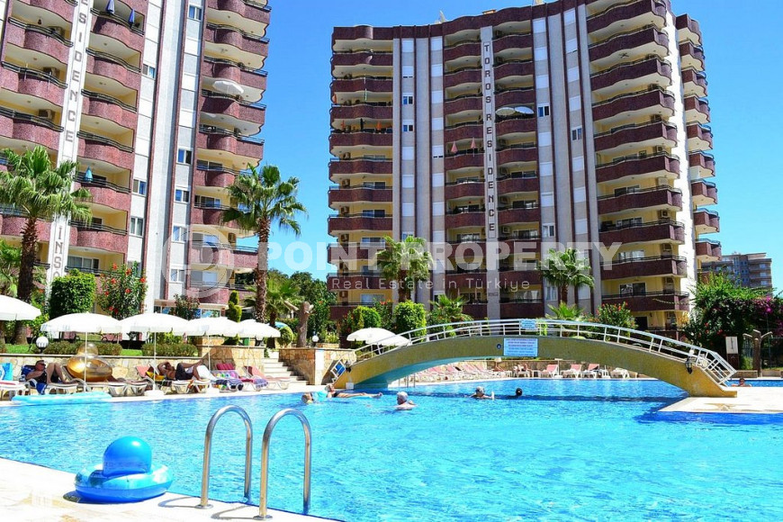 Spacious 2+1 apartment with a good layout, in the investment area of Mahmutlar-id-1048-photo-1