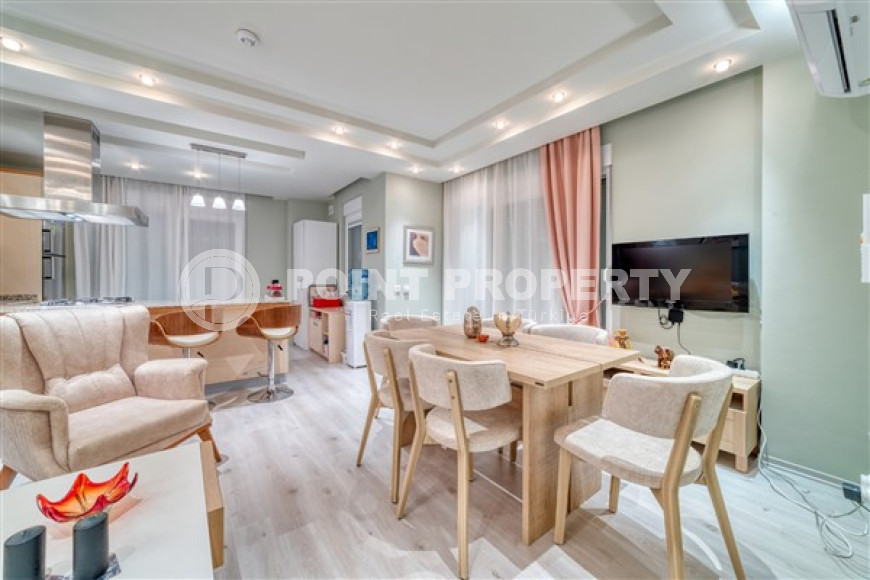 Просторная двухкомнатная квартира с двумя балконами и двумя ванными комнатами на первом этаже-id-4416-фото-2