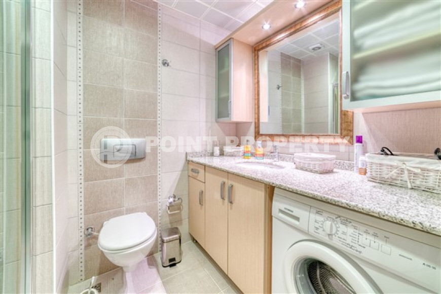 Просторная двухкомнатная квартира с двумя балконами и двумя ванными комнатами на первом этаже-id-4416-фото-10