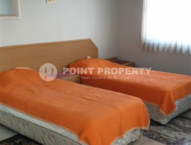 Просторная меблированная квартира с двумя спальнями в 900 метрах от моря в центре Аланьи.-id-4424-фото-5