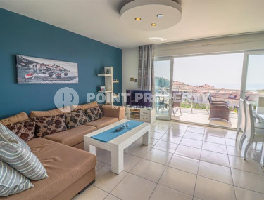 Компактный дуплекс 2+1 на 1-м и 2-м этажах с видом на море в спокойном уютном районе Аланьи Конаклы.-id-4425-фото-1