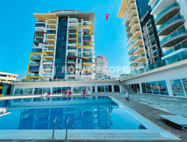 Inexpensive two-room apartment on the 3rd floor of the complex in 2021, Mahmutlar district-id-4435-photo-1