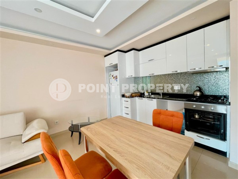 Inexpensive two-room apartment on the 3rd floor of the complex in 2021, Mahmutlar district-id-4435-photo-4