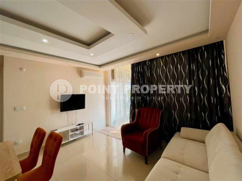 Inexpensive two-room apartment on the 3rd floor of the complex in 2021, Mahmutlar district-id-4435-photo-6