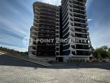 Apartment with an area of 51 m2 on the 7th floor of a high-rise residence, Mahmutlar district-id-4438-photo-1