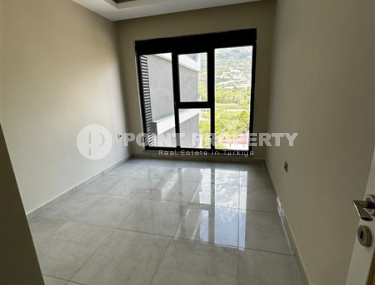 Apartment with an area of 51 m2 on the 7th floor of a high-rise residence, Mahmutlar district-id-4438-photo-2