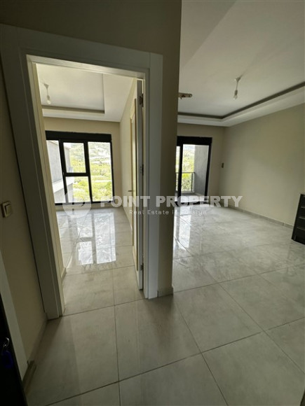 Апартаменты с площадью 51 м2 на 7 этаже высотной резиденции, район Махмутлар-id-4438-фото-3