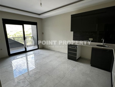 Apartment with an area of 51 m2 on the 7th floor of a high-rise residence, Mahmutlar district-id-4438-photo-4