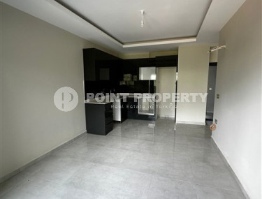 Apartment with an area of 51 m2 on the 7th floor of a high-rise residence, Mahmutlar district-id-4438-photo-5