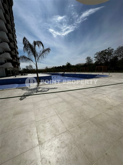 Апартаменты с площадью 51 м2 на 7 этаже высотной резиденции, район Махмутлар-id-4438-фото-14