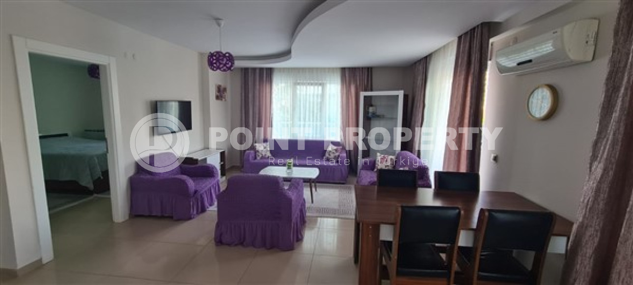 Небольшая квартира 1+1, общей площадью 65 м2, в 450 метрах от моря в центре района Махмутлар.-id-4440-фото-1