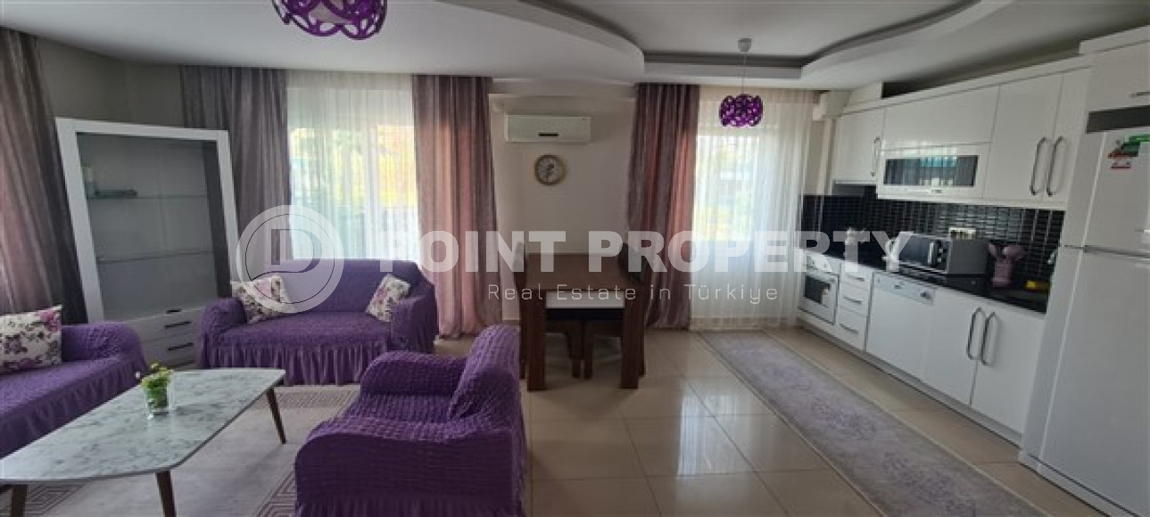 Небольшая квартира 1+1, общей площадью 65 м2, в 450 метрах от моря в центре района Махмутлар.-id-4440-фото-2