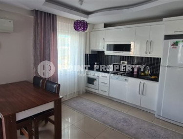 Small apartment 1+1, with a total area of 65 m2, 450 meters from the sea in the center of Mahmutlar.-id-4440-photo-3