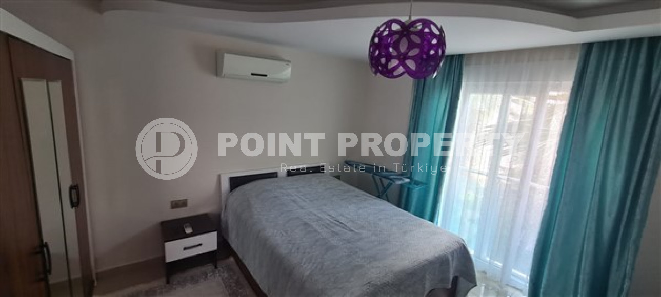 Небольшая квартира 1+1, общей площадью 65 м2, в 450 метрах от моря в центре района Махмутлар.-id-4440-фото-4