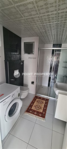 Небольшая квартира 1+1, общей площадью 65 м2, в 450 метрах от моря в центре района Махмутлар.-id-4440-фото-5