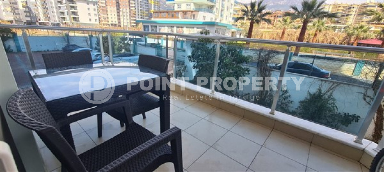 Небольшая квартира 1+1, общей площадью 65 м2, в 450 метрах от моря в центре района Махмутлар.-id-4440-фото-6