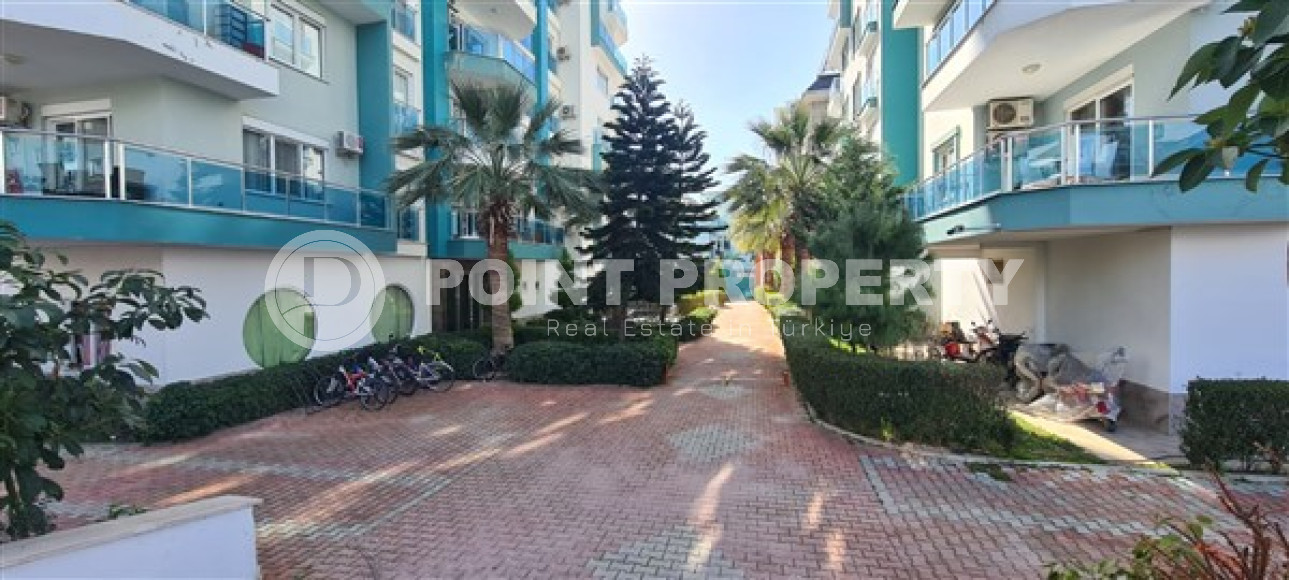 Небольшая квартира 1+1, общей площадью 65 м2, в 450 метрах от моря в центре района Махмутлар.-id-4440-фото-8