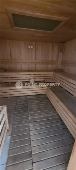 Небольшая квартира 1+1, общей площадью 65 м2, в 450 метрах от моря в центре района Махмутлар.-id-4440-фото-12