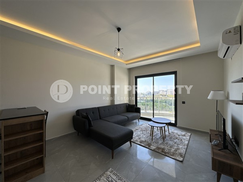 Apartment 1+1 with good repair and modern design on the 1st floor in a residence commissioned in 2022.-id-4443-photo-2