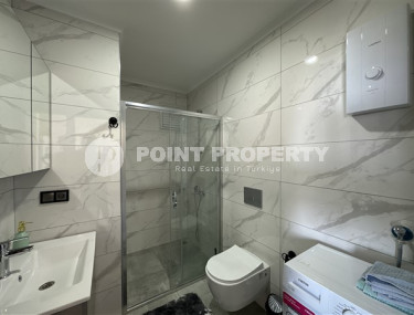 Apartment 1+1 with good repair and modern design on the 1st floor in a residence commissioned in 2022.-id-4443-photo-5