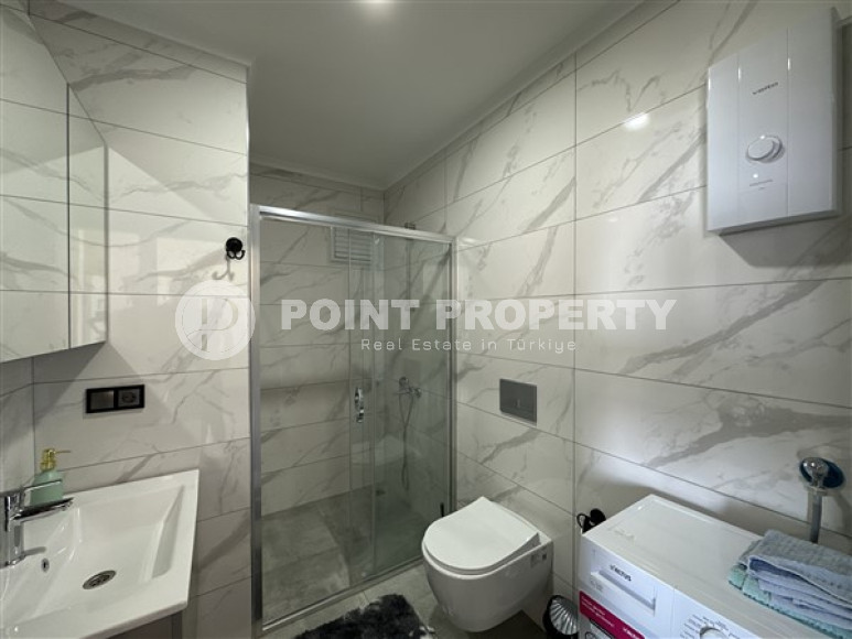 Apartment 1+1 with good repair and modern design on the 1st floor in a residence commissioned in 2022.-id-4443-photo-5