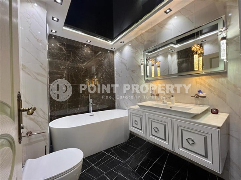 Three-room apartment with furniture on the 10th floor of a high-rise building in the Mahmutlar area-id-4450-photo-8