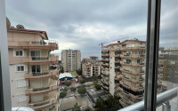 Three-room apartment with furniture on the 10th floor of a high-rise building in the Mahmutlar area-id-4450-photo-10
