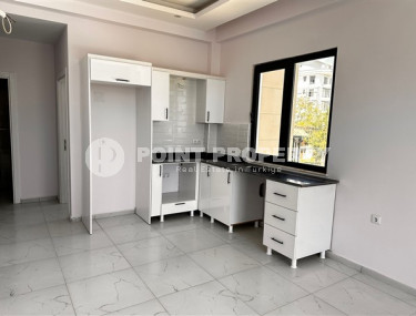 A small apartment with a fine finish in a new residential complex in a quiet, well-maintained area of Avsallar.-id-4453-photo-1
