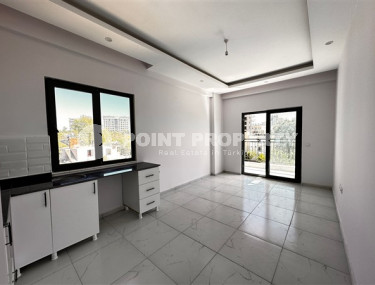 Небольшая квартира с чистовой отделкой в новом жилом комплексе в спокойном благоустроенном районе Авсаллар.-id-4453-фото-2