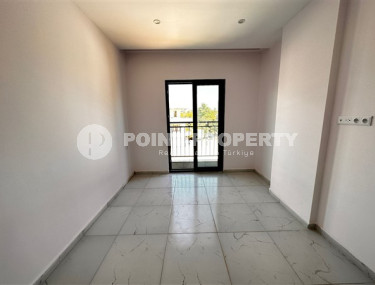 Небольшая квартира с чистовой отделкой в новом жилом комплексе в спокойном благоустроенном районе Авсаллар.-id-4453-фото-3