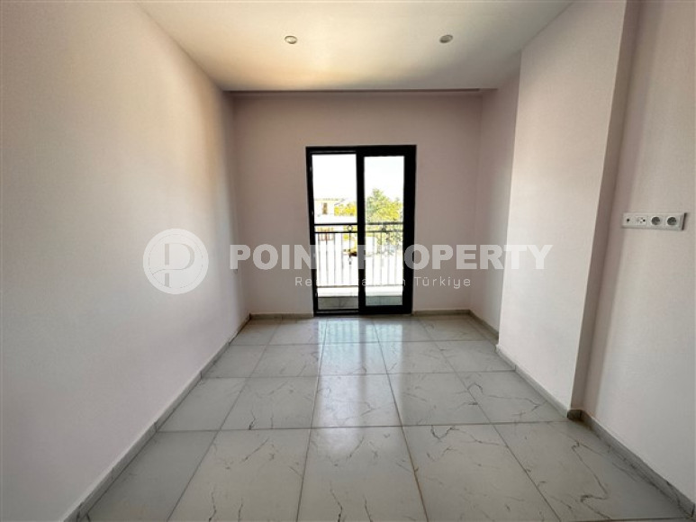 Небольшая квартира с чистовой отделкой в новом жилом комплексе в спокойном благоустроенном районе Авсаллар.-id-4453-фото-3