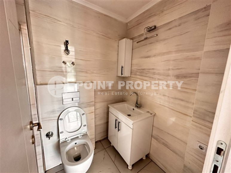 Небольшая квартира с чистовой отделкой в новом жилом комплексе в спокойном благоустроенном районе Авсаллар.-id-4453-фото-4