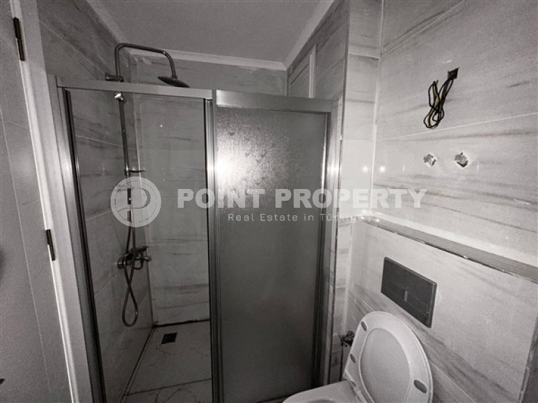 Небольшая квартира с чистовой отделкой в новом жилом комплексе в спокойном благоустроенном районе Авсаллар.-id-4453-фото-5