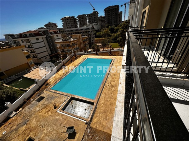 Небольшая квартира с чистовой отделкой в новом жилом комплексе в спокойном благоустроенном районе Авсаллар.-id-4453-фото-15