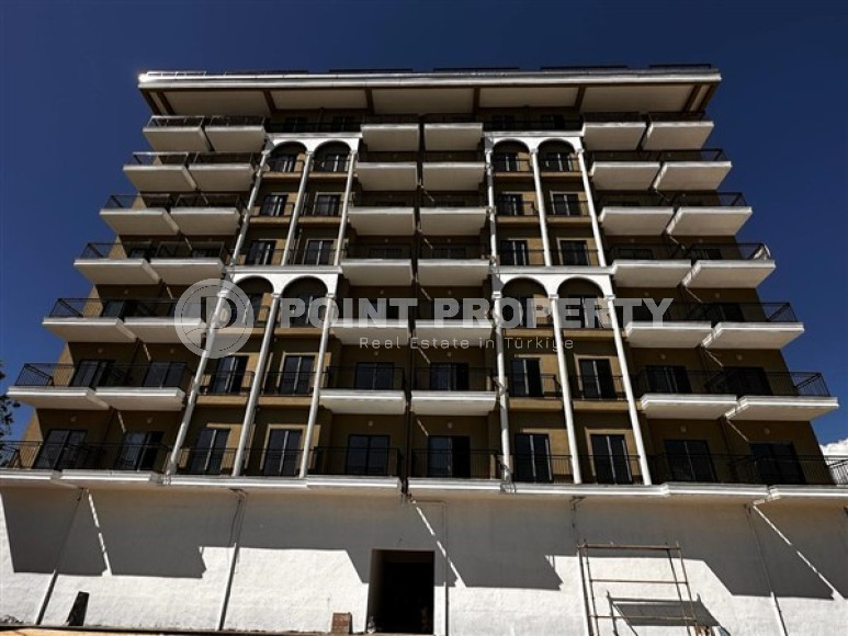 Небольшая квартира с чистовой отделкой в новом жилом комплексе в спокойном благоустроенном районе Авсаллар.-id-4453-фото-16