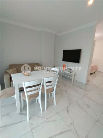 Комфортабельная студия, общей площадью 50 м2, в 900 метрах от моря в перспективном районе Авсаллар.-id-4454-фото-2