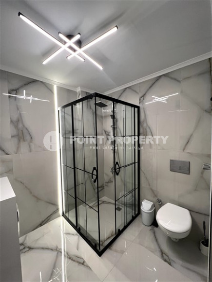 Stylish apartments with designer renovation on the very seashore in the center of Mahmutlar.-id-4455-photo-9