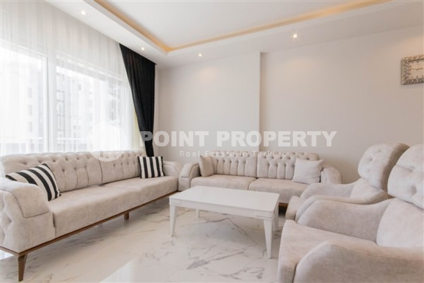 Прекрасная светлая квартира 1+1 на 8-м этаже с панорамным видом на город и горы в 500 метрах от моря.-id-4459-фото-2