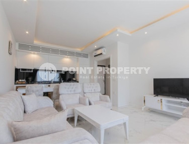 Beautiful bright 1+1 apartment on the 8th floor with panoramic views of the city and mountains, 500 meters from the sea.-id-4459-photo-3