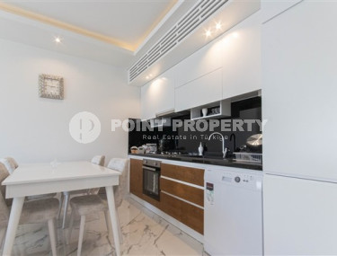 Beautiful bright 1+1 apartment on the 8th floor with panoramic views of the city and mountains, 500 meters from the sea.-id-4459-photo-4