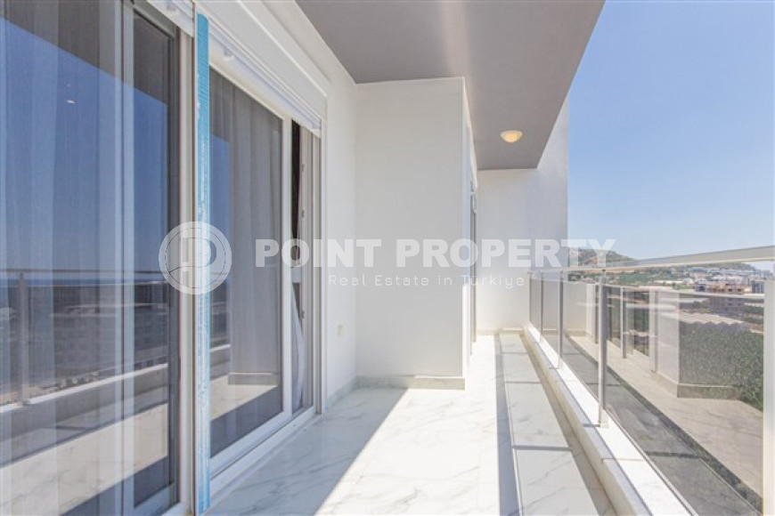 Прекрасная светлая квартира 1+1 на 8-м этаже с панорамным видом на город и горы в 500 метрах от моря.-id-4459-фото-7