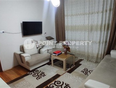 Budget 1+1 apartment in the center of Alanya and 150 meters from Cleopatra Beach.-id-4461-photo-1