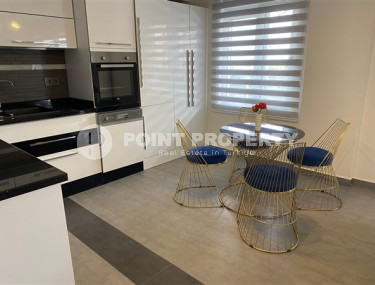 Comfortable modern 2+1 apartments with a total area of 110 m2 in the popular Oba area of Alanya.-id-4462-photo-2